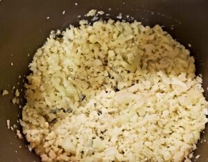 Cauliflower simmering in chicken broth